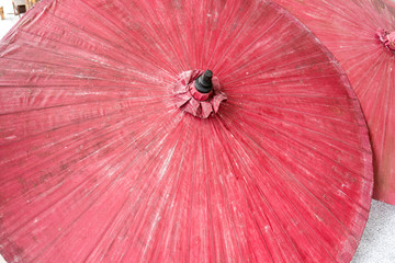 The big red umbrella made from the paper