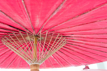 The big red umbrella made from the paper