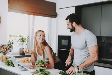 A Couple Is Preparing A Salad For A Breakfast.