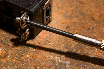 Small screwdriver in bolt