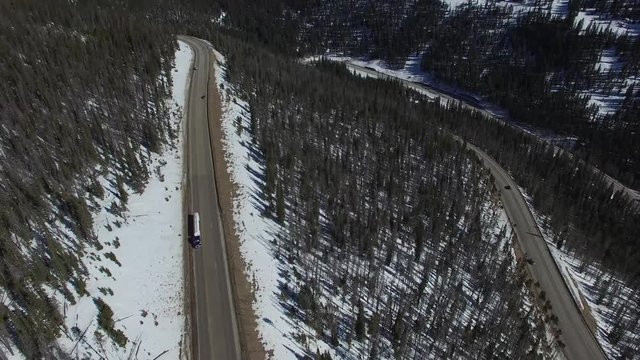 Aerial drone footage of Colorado highway over  Berthoud Pass and Continental Divide