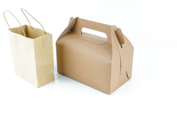 Kraft Paper portable box and shopping bag over white background