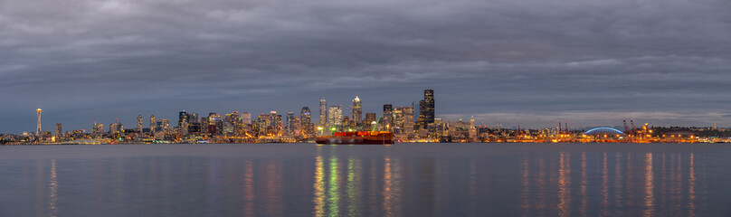 Seattle Lighted Skyline Reflected on the Ocean