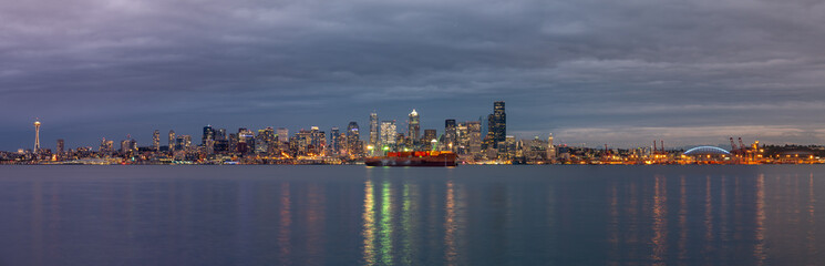 Fototapeta na wymiar Downtown Seattle Skyline With Large Boat in the Foreground