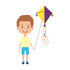 cute little boy playing with kite