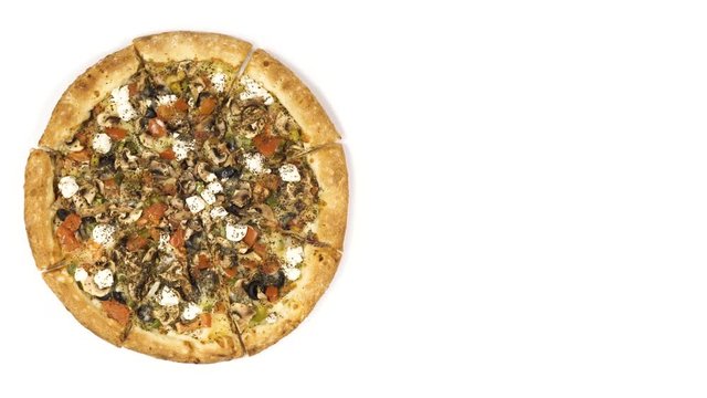 Rotating pizza with smoked sausage and olives on a white background. Top view center orientation