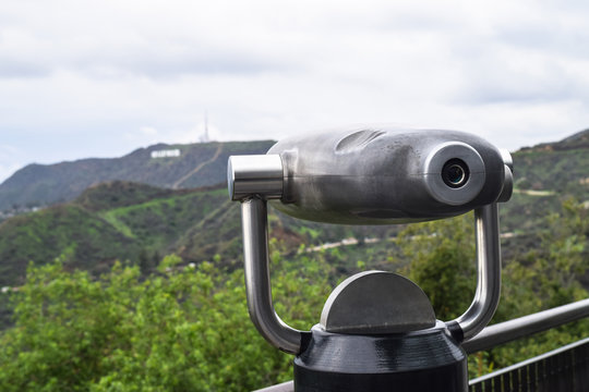 Griffith Park, Los Angeles - monocular telescope and view on the Hollywood signboard