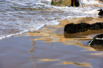 Water and waves on the beach at Coffs Harbour NSW