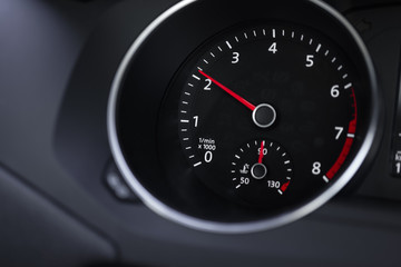A Modern Car odometer Cluster with LCD Multifunction Display. Meter at constant speed show the fuel...