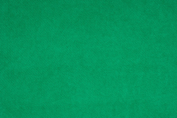 Green fabric texture background.