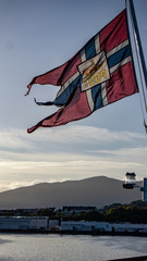 The Norwegian Flag in the Foreground in front of Alesund