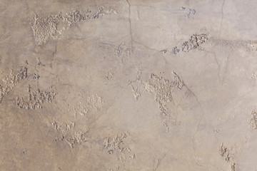 Fragment of decorative plaster on the wall - Map under a natural stone. Modern design and decor