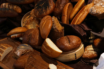 different bread rolls on the table bakeries