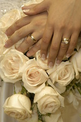 bride and groom holding hands