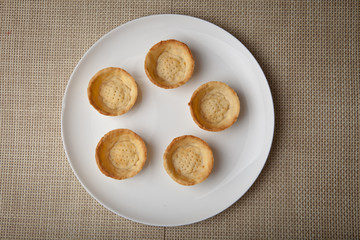 tartlets on a white plate