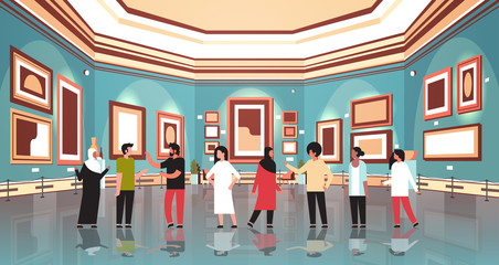 mix race people tourists in modern art gallery museum interior looking creative contemporary paintings artworks or exhibits visitors communication concept horizontal - obrazy, fototapety, plakaty