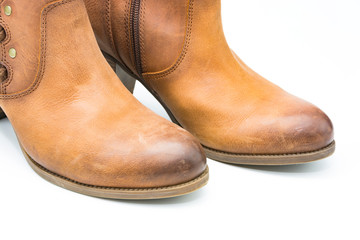 Women's autumn shoes made of genuine brown leather with laces on an isolated background. Spring shoes with heels 