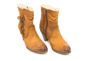 Women's autumn shoes made of genuine brown leather with laces on an isolated background. Spring shoes with heels 