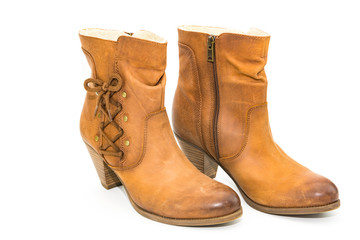 Women's autumn shoes made of genuine brown leather with laces on an isolated background. Spring shoes with heels 