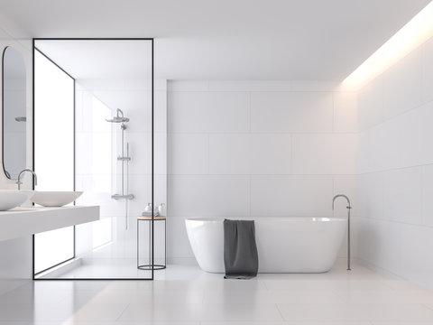 Minimal style white bathroom 3d render, There are large white tile wall and floor.There have glass partition for shower zone,The room has large windows.Natural light transmitted through the room.