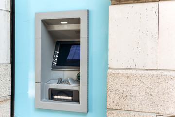 Modern street ATM machine for withdrawal of money and other financial transactions.
