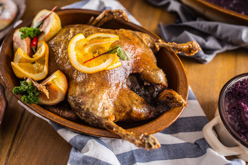 Roasted christmas duck red cabbage dumplings liver draft beer and baked buns.