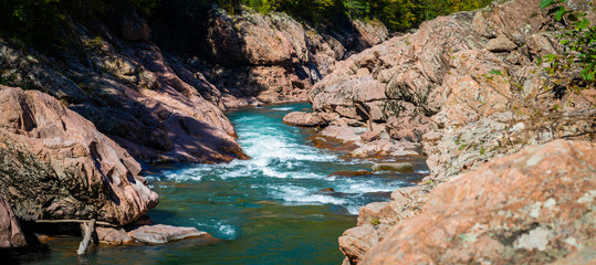Landscape with a Belaya river flowing through canyon in Adygea