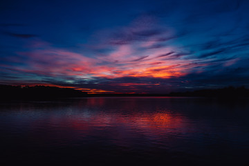 beautiful sunset over water, high contrast
