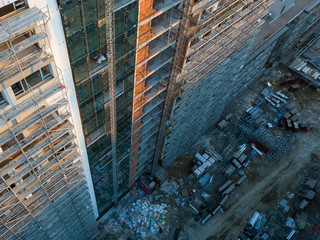 Aerial top view of building facade under construction