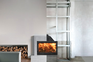 Installation of wood stove insert in livingroom