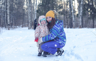 family walks on Winter Park during the weekend