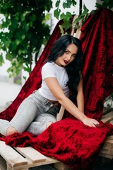 Fototapeta premium Portrait of beautiful young brunette woman with makeup