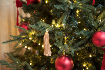 Happy new year and Merry Christmas concept. Beautiful Christmas tree with new year decoration and toys