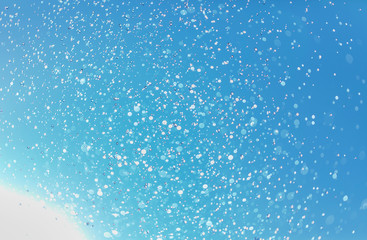 Fototapeta na wymiar Winter landscape with falling snow. Winter christmas sky with falling snow