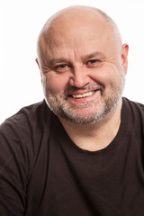 Bald man laughs,close-up