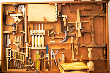 old carpenter's manual tools in an old carpentry shop
