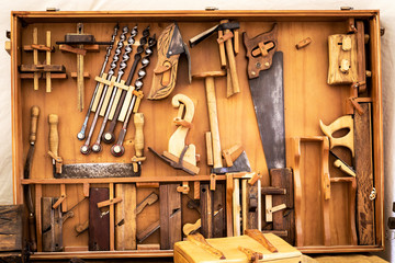 old carpenter's manual tools in an old carpentry shop
