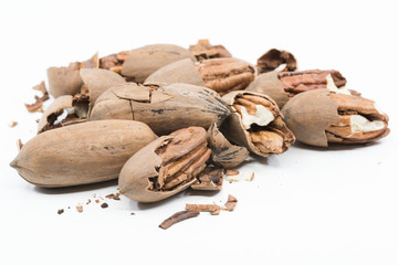 Cracked pean nuts on white background