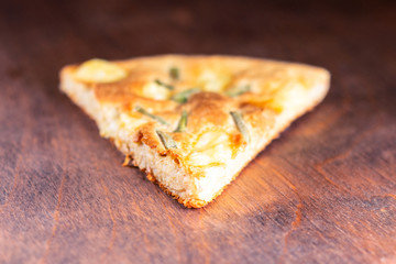 slice of pizza oatmeal with green onion.