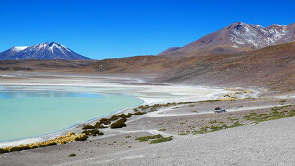 Laguna Verde is a salt lake, in the southwestern Altiplano in Bolivia. In the backdrop of the lake...