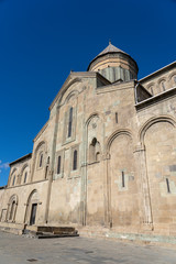 Fototapeta na wymiar Old Orthodox cathedral in Mtskheta near Tbilisi, Georgia. Autumn sunny day.