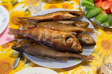 Smoked fish cooked in a home smokehouse