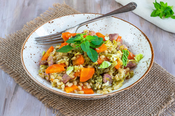 Pearl barley and bacon cassarole with carrots, leek and savoy cabbage