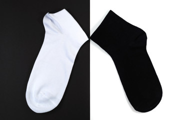 couple new socks black white on background