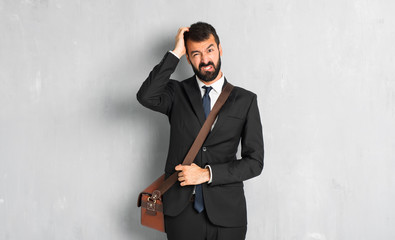 Businessman with beard with an expression of frustration and not understanding