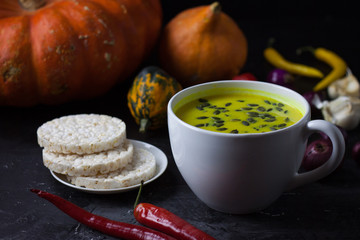 Pumpkin asian coconat cream soup. Autumn hot food