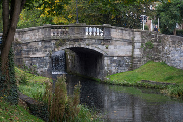 Grand Canal in Dublin, Ireland with old 18th Century stone bridge