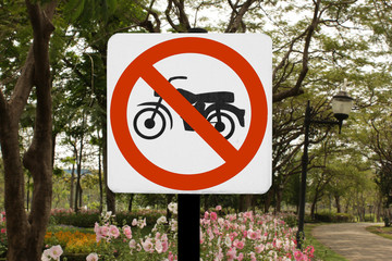 selective focus at motorcycle prohibition sign at public park,warning sign