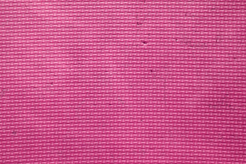 old and dirty pink foam or rubber floor and soft board on top view for baby girl or female children protect and play on playground and for texture or background with wallpaper