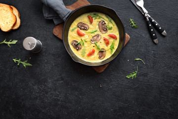 Omelette with mushrooms and vegetables